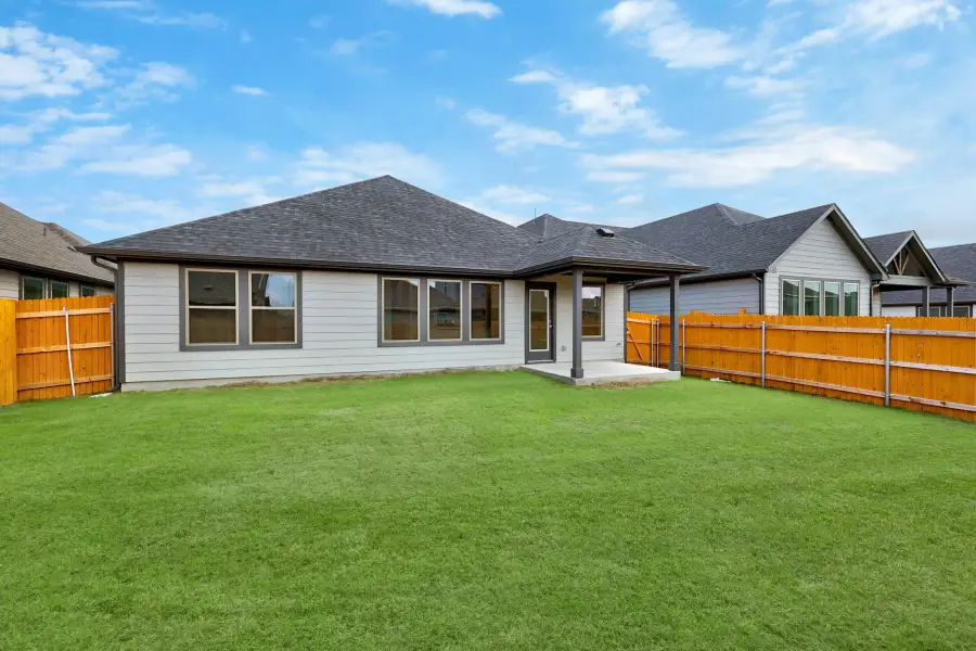 Exterior details and patio area of a home in Prairie Winds, Hutto (Image 19).
