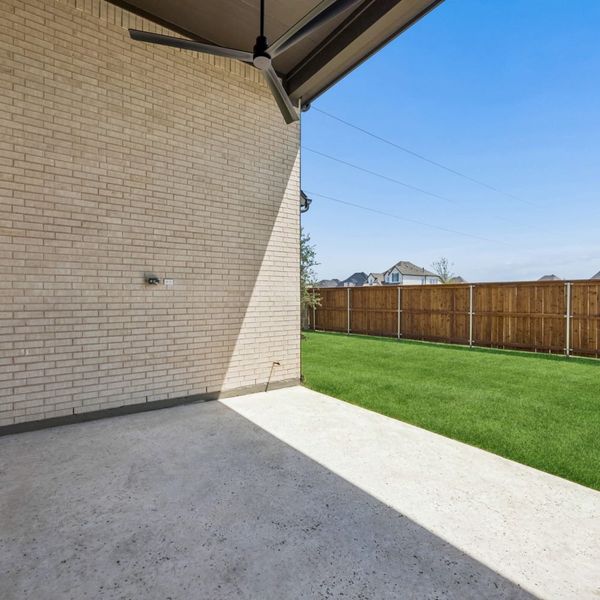 Exterior details and patio area of a home in The Parks at Wilson Creek, Celina (Image 29).