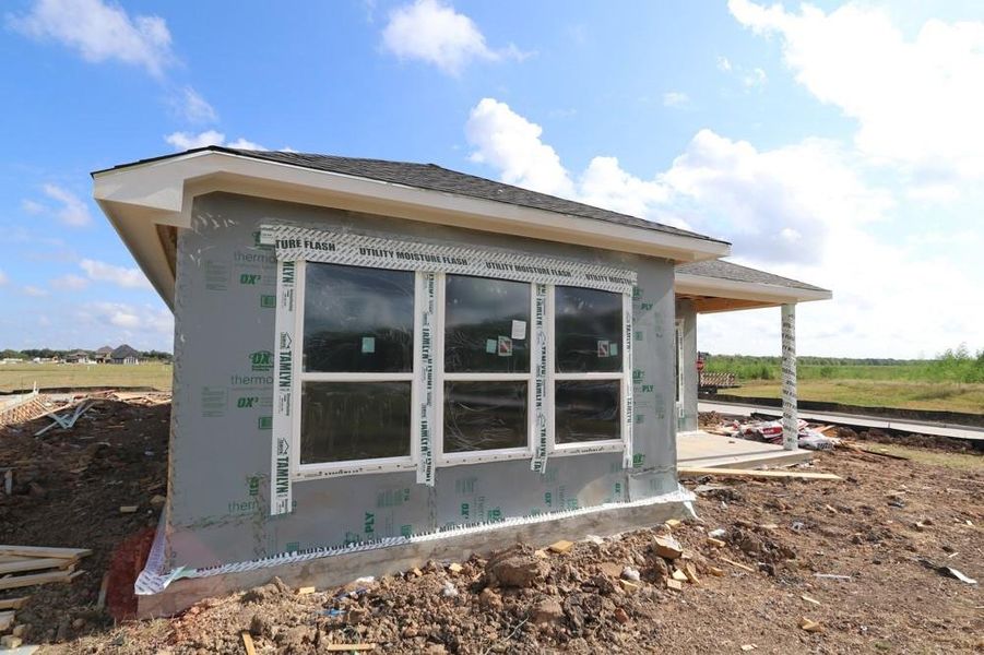 Front exterior of a new home in Austin Point, Richmond, TX, highlighting curb appeal (Image 1). Front exterior of a new home in Austin Point, Richmond, TX, highlighting curb appeal (Image 1).