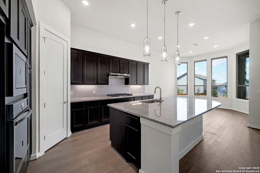 Furnished interior view inside a new home in VIDA, San Antonio (Image 8).