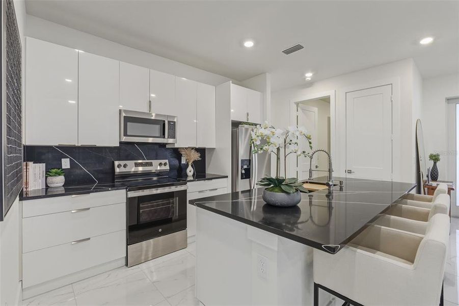 Furnished interior view inside a new home in , Port Charlotte (Image 28). Furnished interior view inside a new home in , Port Charlotte (Image 28).