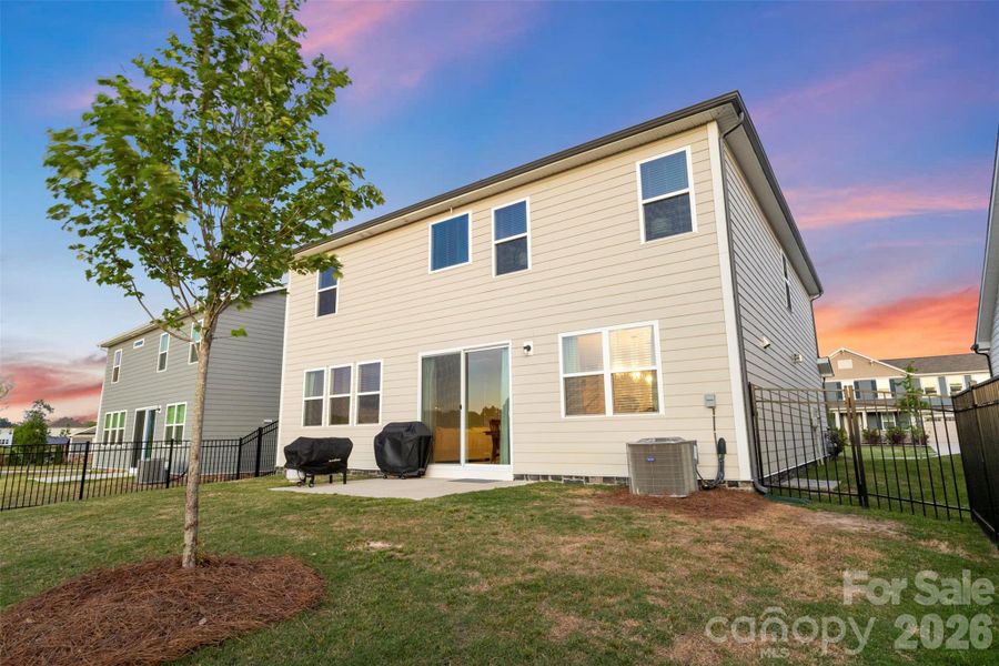 Exterior details and patio area of a home in Waxhaw Landing, Monroe (Image 4).