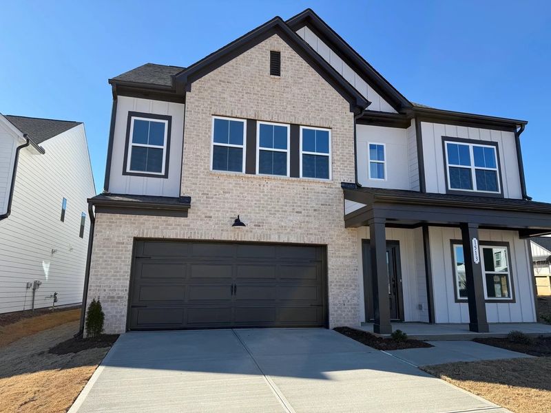 Exterior  - Earthy and warm tones feel rooted in place.