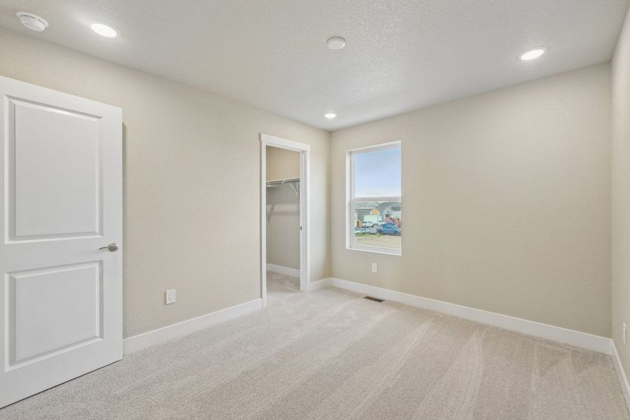 Spacious, unfurnished interior of a new home in The Trails at Aspen Ridge, Colorado Springs (Image 50).