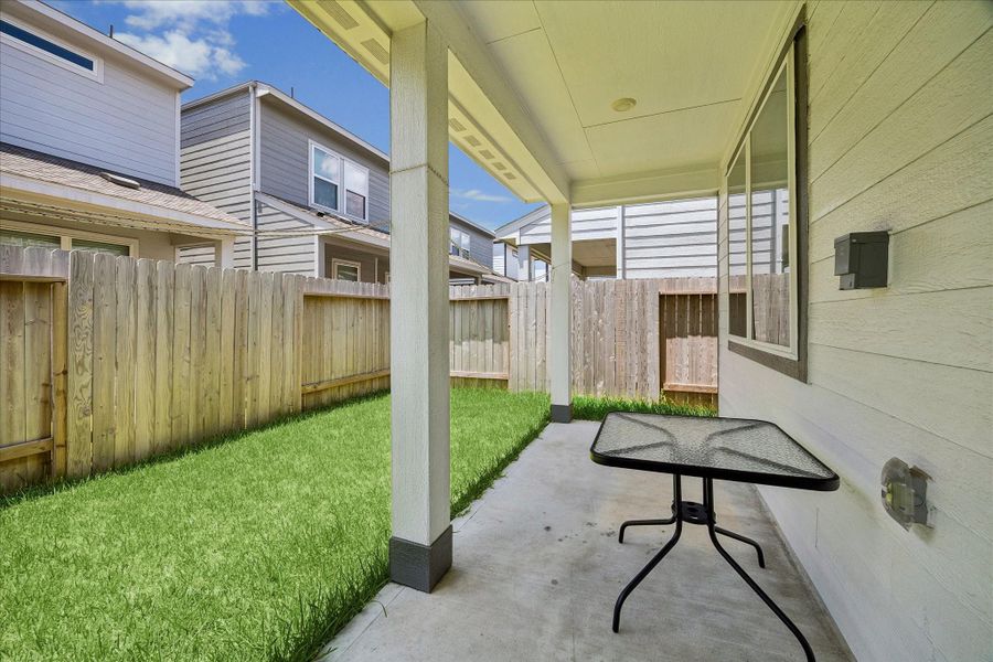 Exterior details and patio area of a home in Dunvale Village - Townhome Collection, Houston (Image 24).