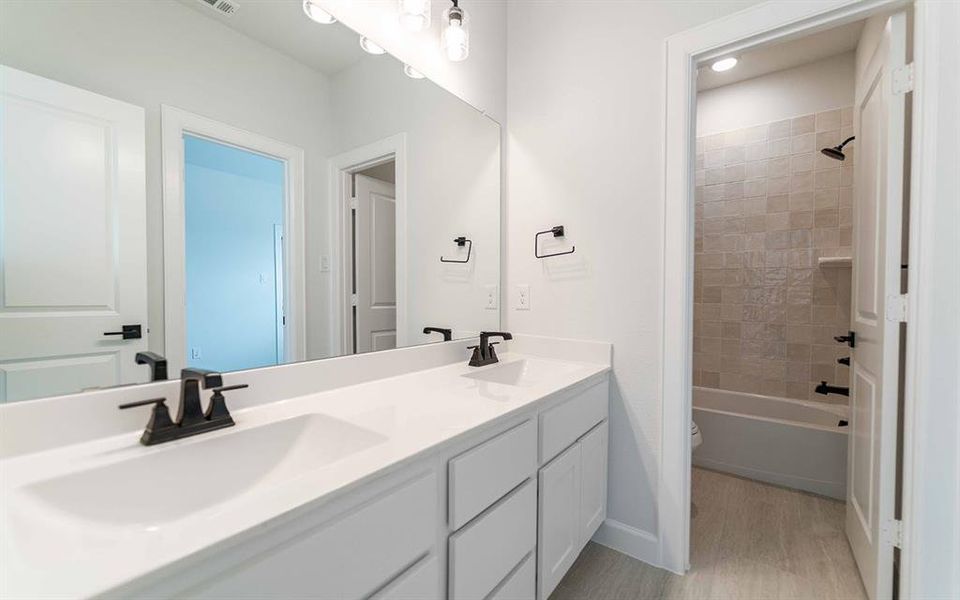 Furnished interior view inside a new home in Heath Golf & Yacht Club, Forney (Image 11).