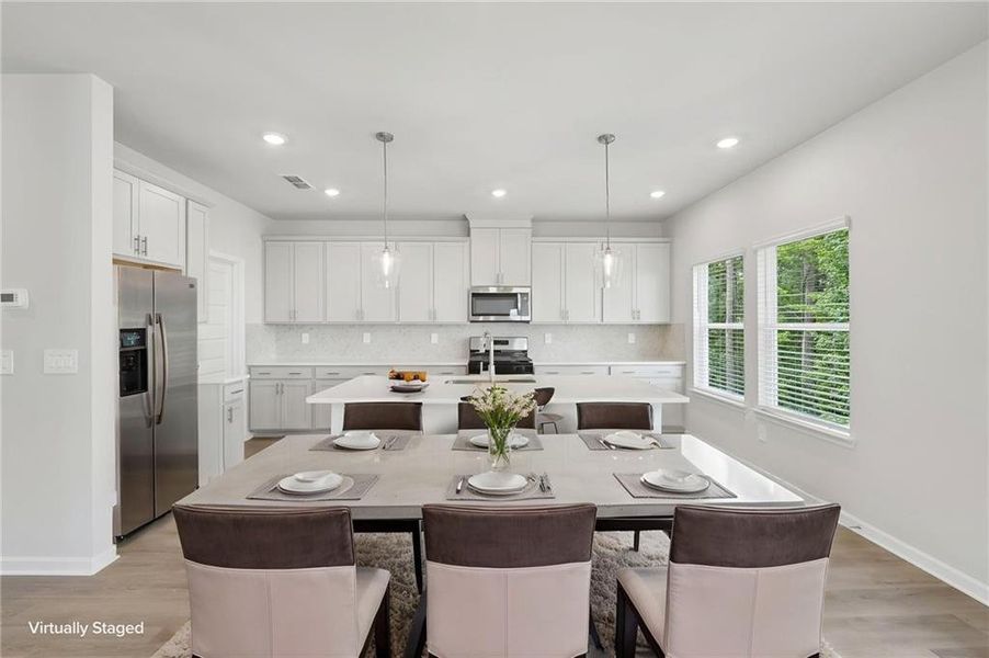 Furnished interior view inside a new home in Martin Springs - Estate Series, Lawrenceville (Image 16).