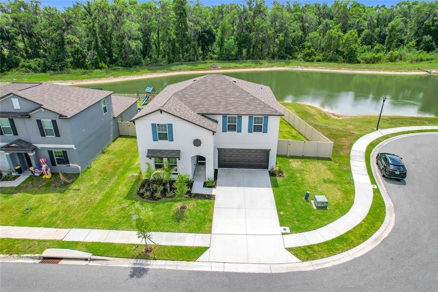 Front exterior of a new home in , Lakeland, FL, highlighting curb appeal (Image 28).