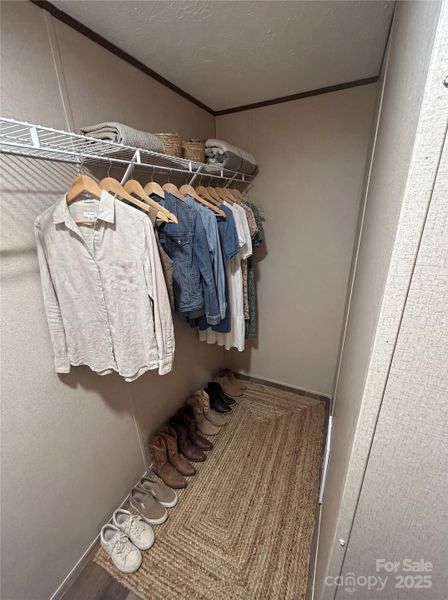 Primary bath closet virtually staged
