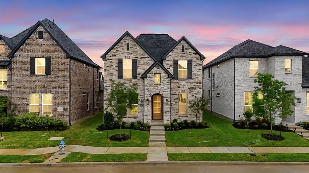 Front exterior of a new home in Light Farms Brenham - 40' Lots, Celina, TX, highlighting curb appeal (Image 2). Front exterior of a new home in Light Farms Brenham - 40' Lots, Celina, TX, highlighting curb appeal (Image 2).