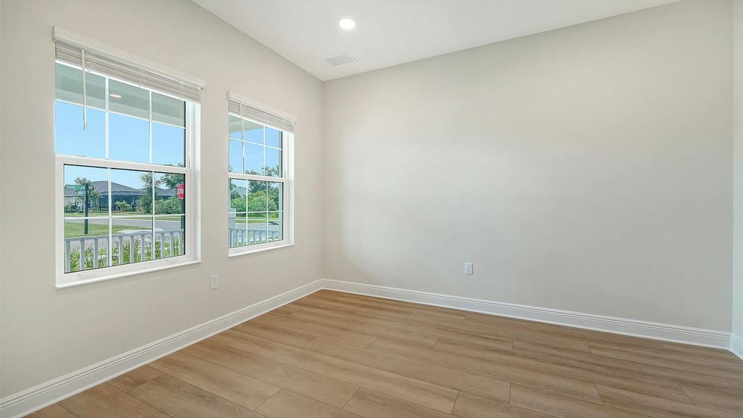 Spacious, unfurnished interior of a new home in Wildleaf Real Estate and Homes for Sale in Parrish, FL - Neal Communities, Parrish (Image 27).