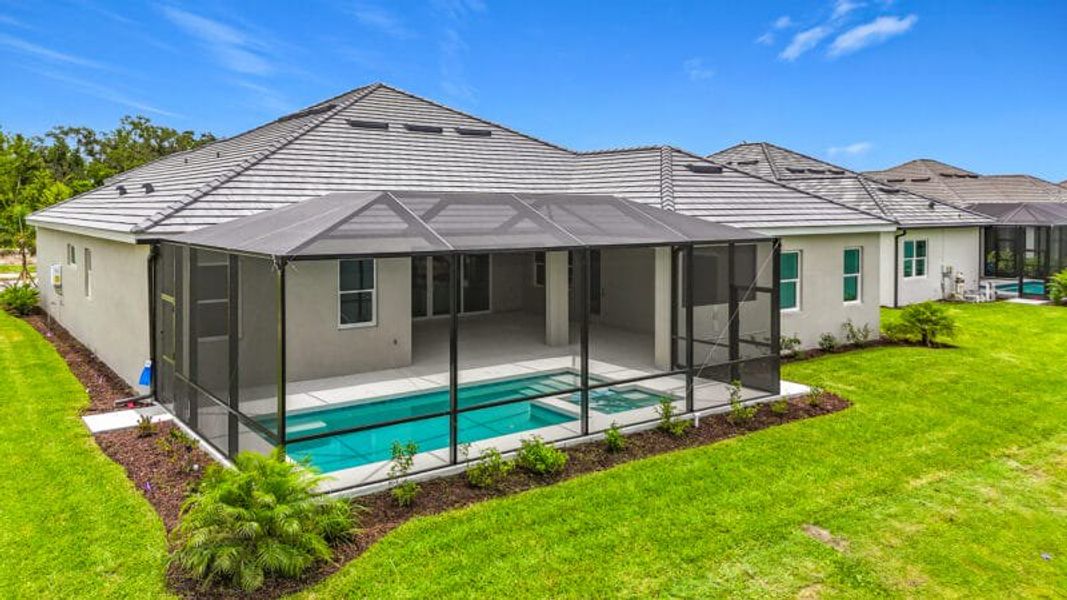 Exterior details and patio area of a home in River Preserve Estates, Parrish (Image 28).