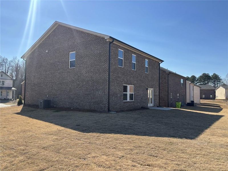 Exterior details and patio area of a home in Kendall Grove, McDonough (Image 3).