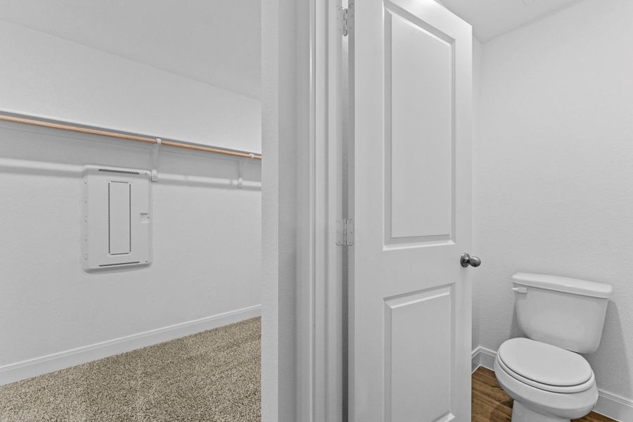 Furnished interior view inside a new home in Railhead, Cedar Creek (Image 12).