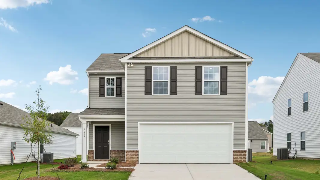 Front exterior of a new home in Huffman Ridge, Hickory, NC, highlighting curb appeal (Image 1). Front exterior of a new home in Huffman Ridge, Hickory, NC, highlighting curb appeal (Image 1).