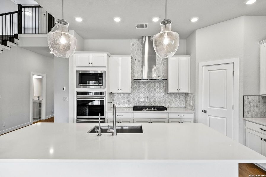 Furnished interior view inside a new home in Davis Ranch 60', San Antonio (Image 11).
