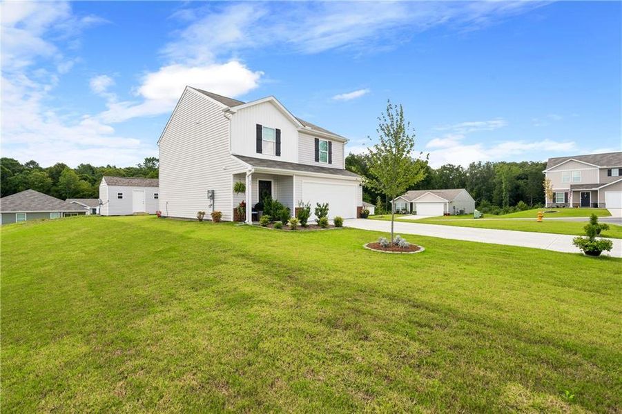 Front exterior of a new home in Urban's Place, Chatsworth, GA, highlighting curb appeal (Image 22).