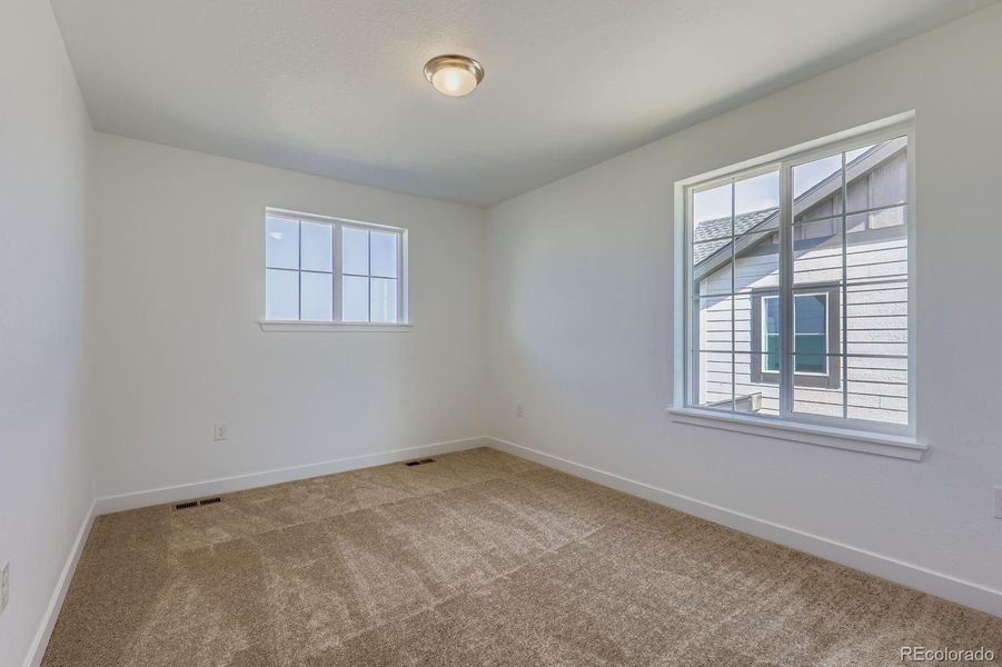 Spacious, unfurnished interior of a new home in Sunset Village: The Monarch Collection, Erie (Image 10). Spacious, unfurnished interior of a new home in Sunset Village: The Monarch Collection, Erie (Image 10).