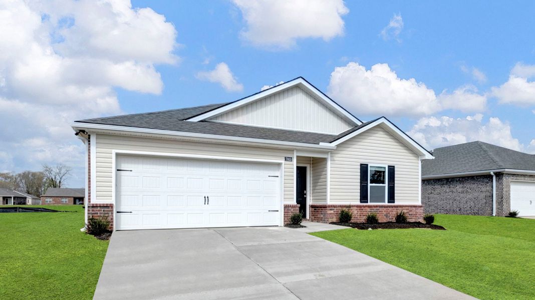 Front exterior of a new home in Huntington Estates, Millington, TN, highlighting curb appeal (Image 2).