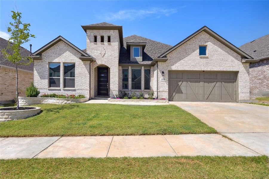 Front exterior of a new home in , Oak Point, TX, highlighting curb appeal (Image 21).