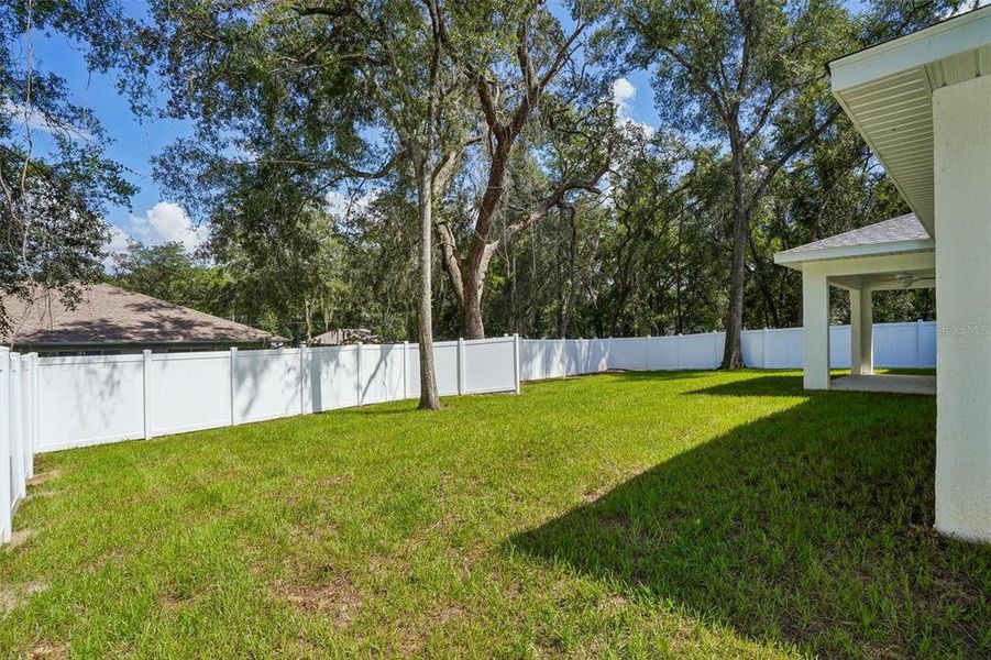 Exterior details and patio area of a home in , Citrus Springs (Image 31).