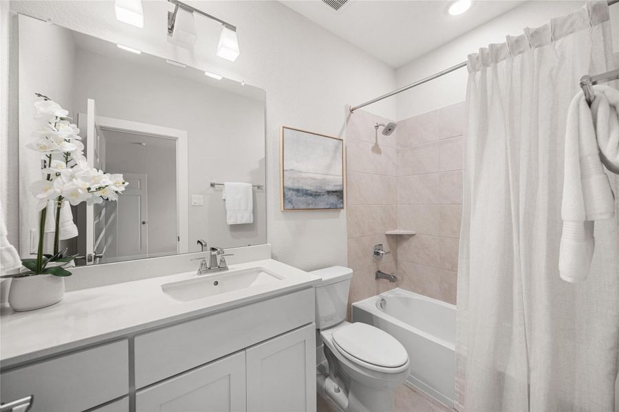 Furnished interior view inside a new home in Woodson’s Reserve, Spring (Image 36).