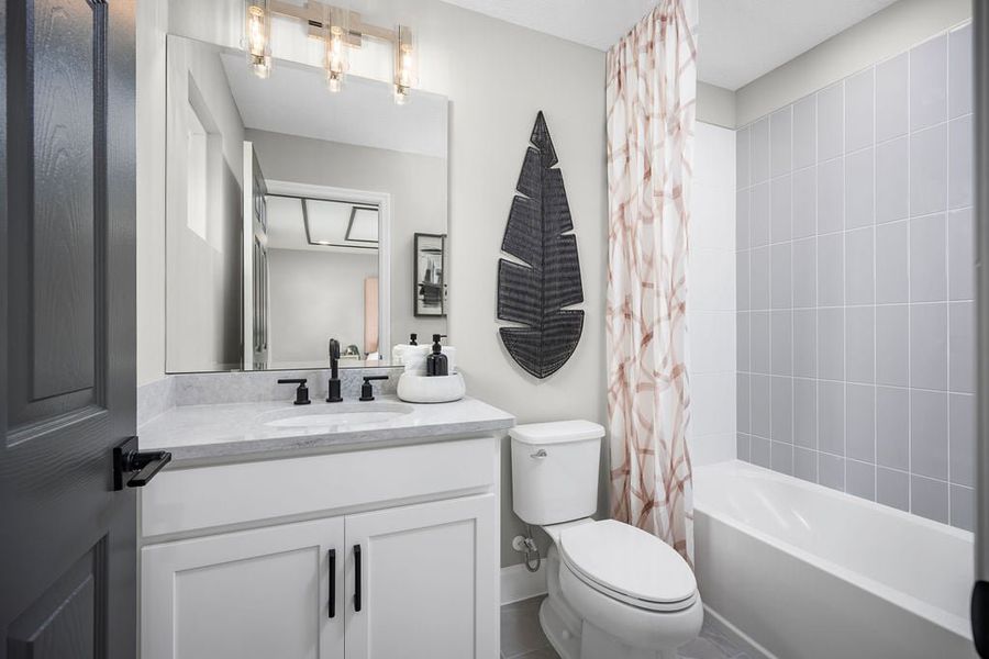 Representative furnished interior of a home built from the Maple by Risewell Homes in Cypress Bluff, Groveland (Image 12).