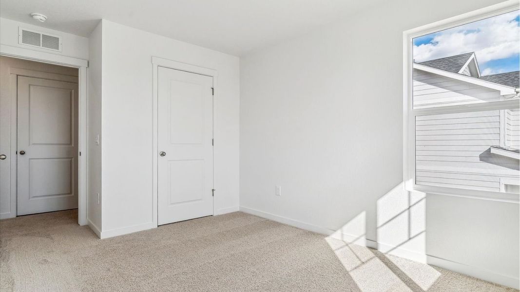 Spacious, unfurnished interior of a new home in Ridge at Johnstown, Johnstown (Image 13).