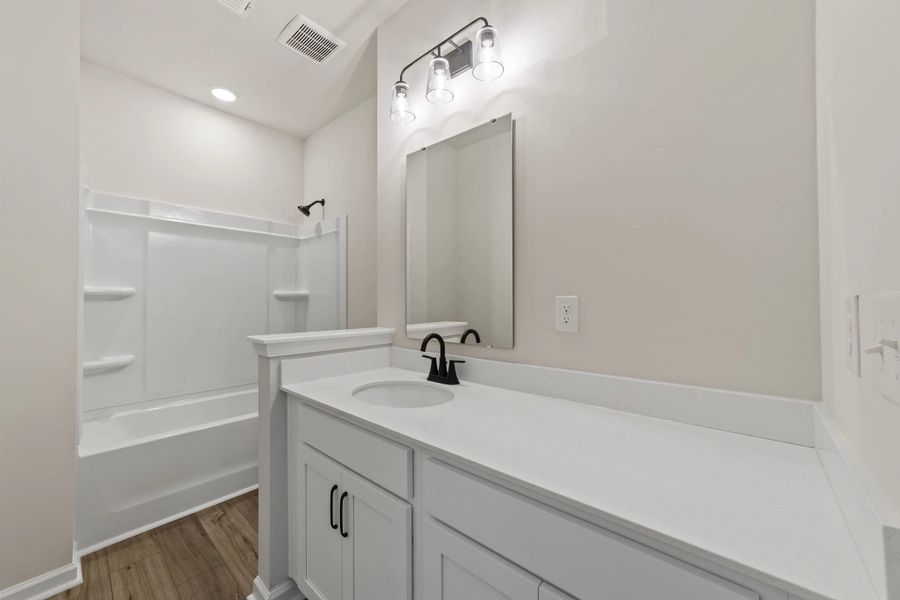 Furnished interior view inside a new home in Blue Heron Retreat, Little River (Image 9).