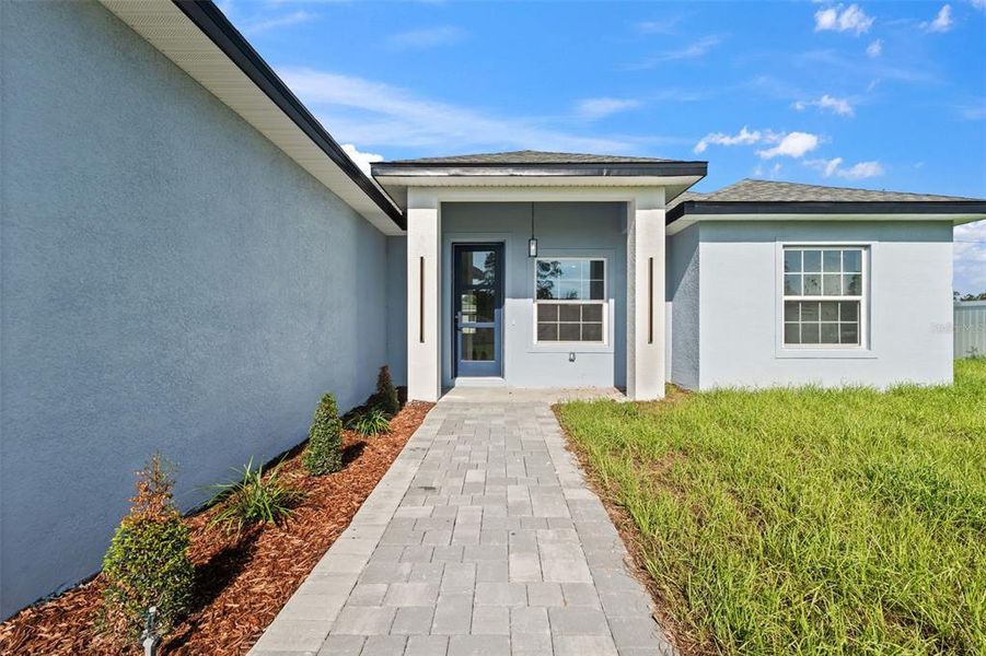 Front exterior of a new home in , Ocala, FL, highlighting curb appeal (Image 20).
