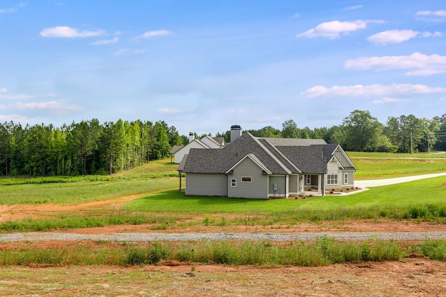 Front exterior of a new home in Harmon Springs, Carrollton, GA, highlighting curb appeal (Image 27).