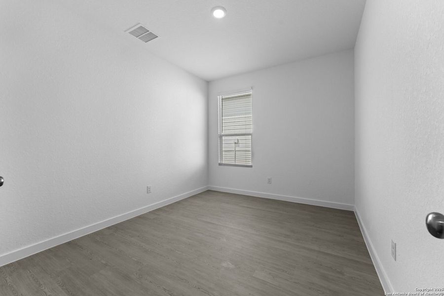 Spacious, unfurnished interior of a new home in Waterwheel: Coastline Collection, San Antonio (Image 26).