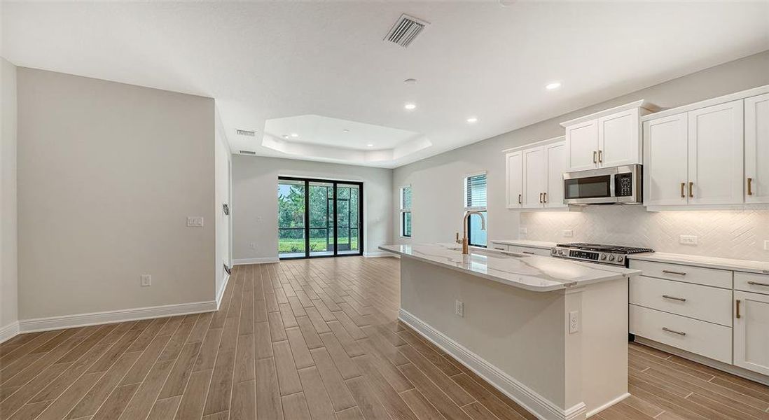Furnished interior view inside a new home in Vicenza Real Estate and Homes for Sale in North Venice, FL - Neal Communities, Nokomis (Image 12). Furnished interior view inside a new home in Vicenza Real Estate and Homes for Sale in North Venice, FL - Neal Communities, Nokomis (Image 12).