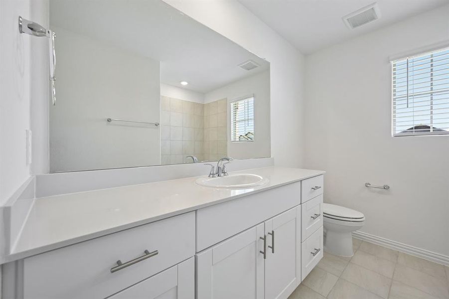 Furnished interior view inside a new home in Parks at Foster Crossing - Spring Series, Anna (Image 11).