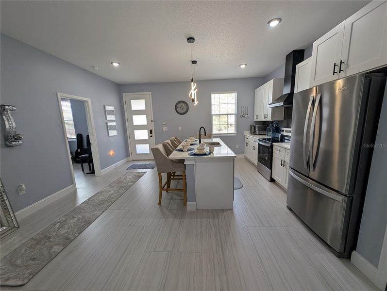 Furnished interior view inside a new home in , Poinciana (Image 44).