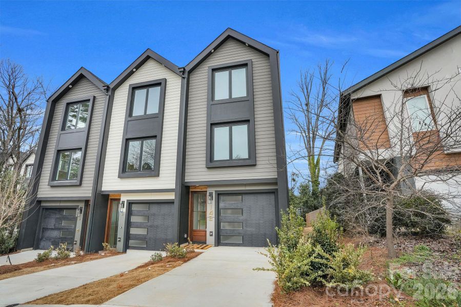 Front exterior of a new home in , Charlotte, NC, highlighting curb appeal (Image 27).