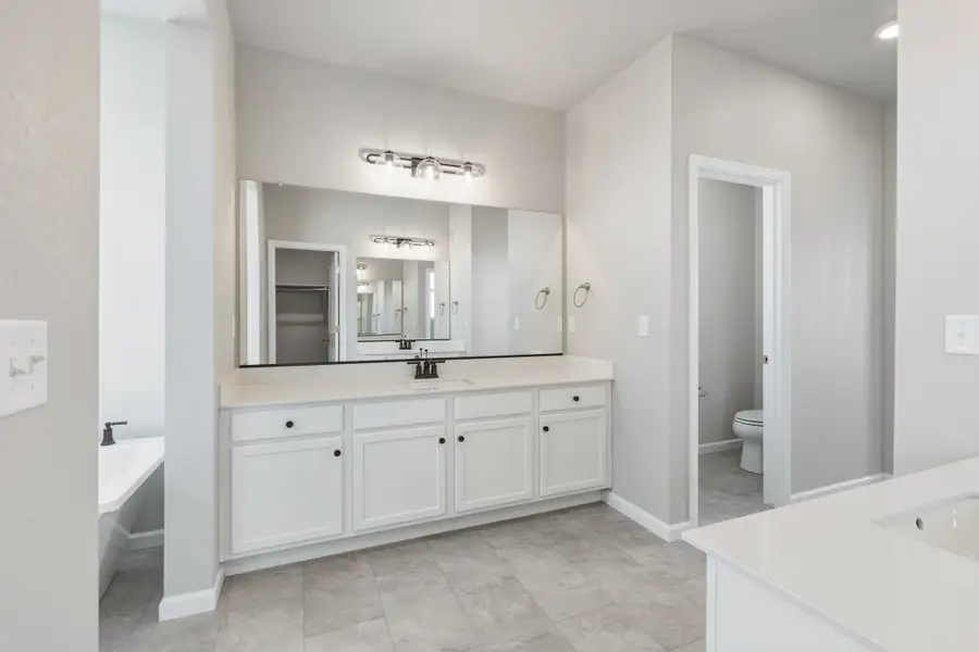 Furnished interior view inside a new home in The Aurora Highlands, Aurora (Image 9).