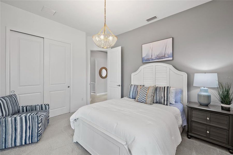 Furnished interior view inside a new home in Calusa Country Club, Lakewood Ranch (Image 27).
