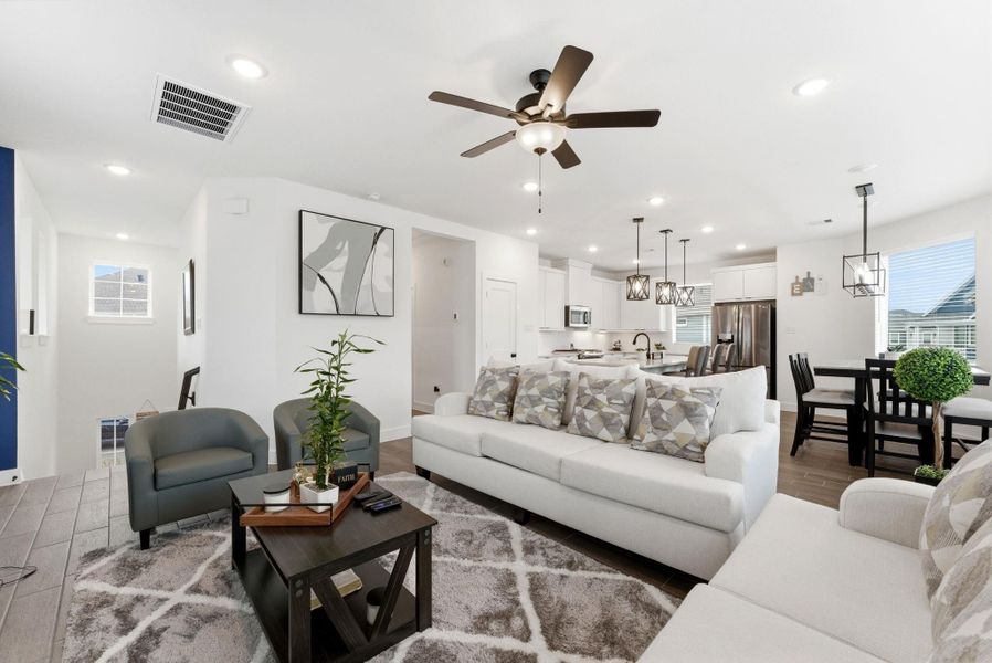 Open living space that keeps everyone connected—from relaxing on the sofa to cooking in the kitchen.