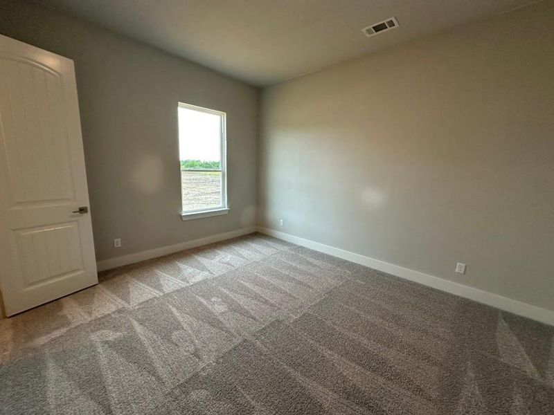 Spacious, unfurnished interior of a new home in Fannin Ranch, Leonard (Image 21).