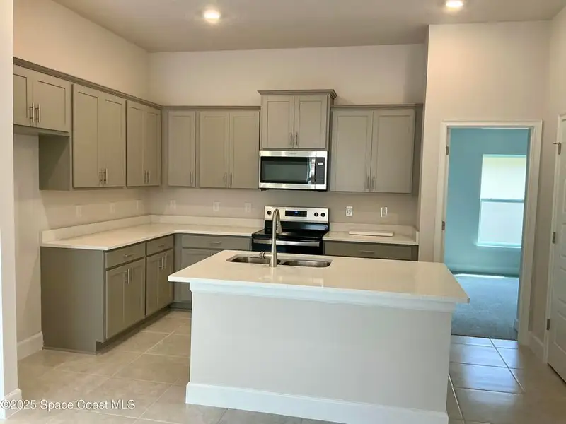 Furnished interior view inside a new home in St. John Preserve, Palm Bay (Image 4). Furnished interior view inside a new home in St. John Preserve, Palm Bay (Image 4).