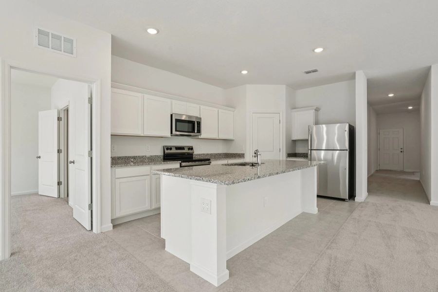 Representative furnished interior of a home built from the Equinox by Starlight Homes in Landings at Mount Olive, Polk City (Image 12). Representative furnished interior of a home built from the Equinox by Starlight Homes in Landings at Mount Olive, Polk City (Image 12).