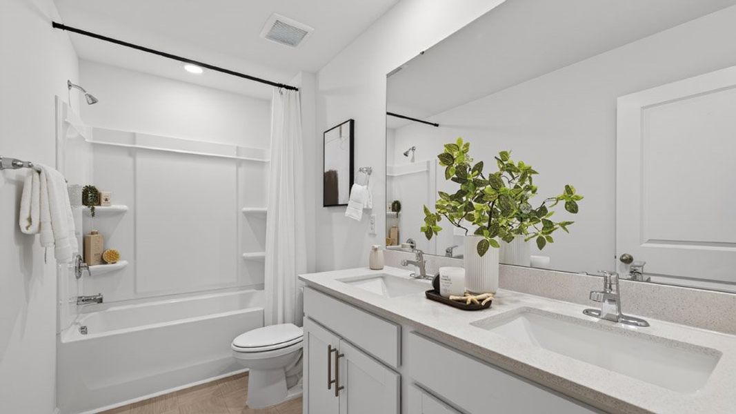 Representative furnished interior of a home built from the Hanover by D.R. Horton in The Landing at Winston Pointe, Clayton (Image 11).
