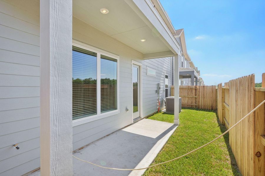 Front exterior of a new home in Kemah Crossing - Luxe Series, Kemah, TX, highlighting curb appeal (Image 2).