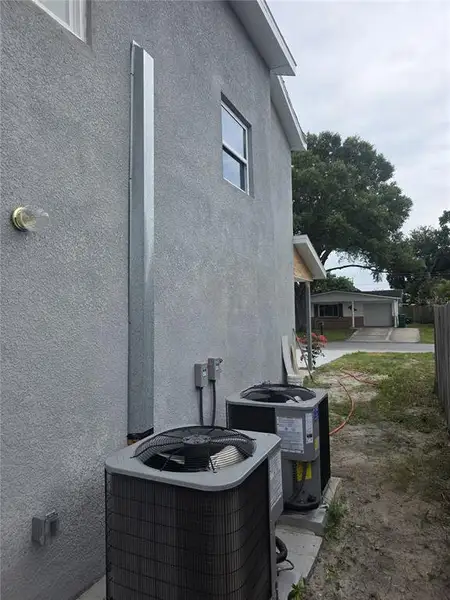 Exterior details and patio area of a home in , Holiday (Image 14).