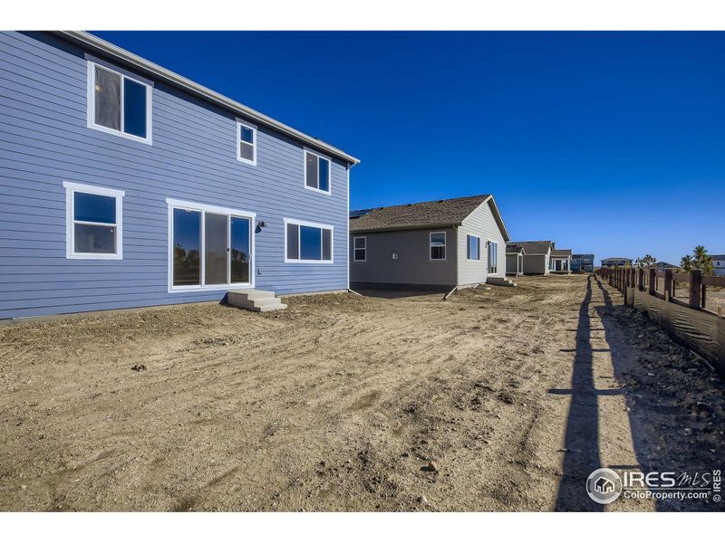 Exterior details and patio area of a home in Country Club Reserve, Fort Collins (Image 24).