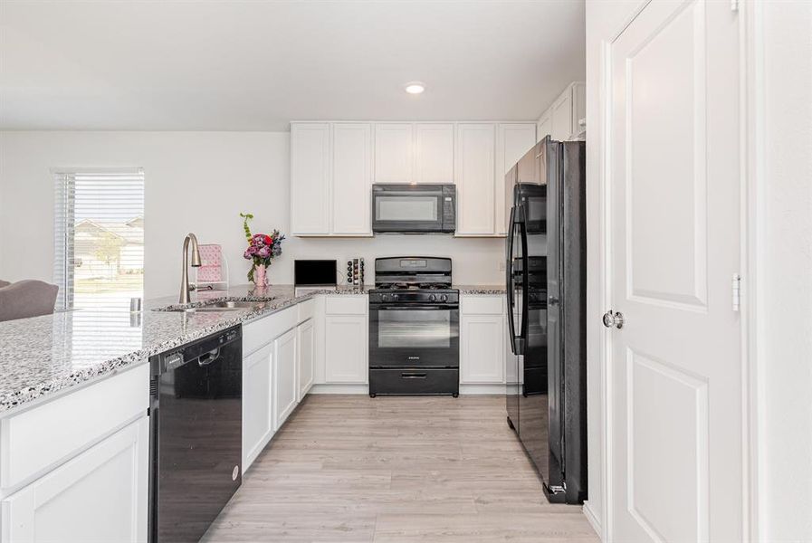 Furnished interior view inside a new home in Walden Pond: Cottage East, Forney (Image 10).