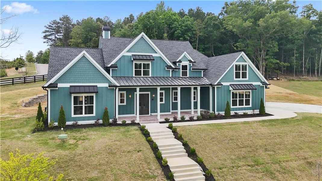 Front exterior of a new home in , Dacula, GA, highlighting curb appeal (Image 25).