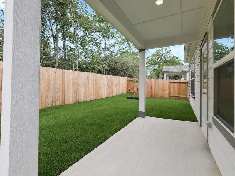Exterior details and patio area of a home in Caney Creek Place, Conroe (Image 4). Exterior details and patio area of a home in Caney Creek Place, Conroe (Image 4).
