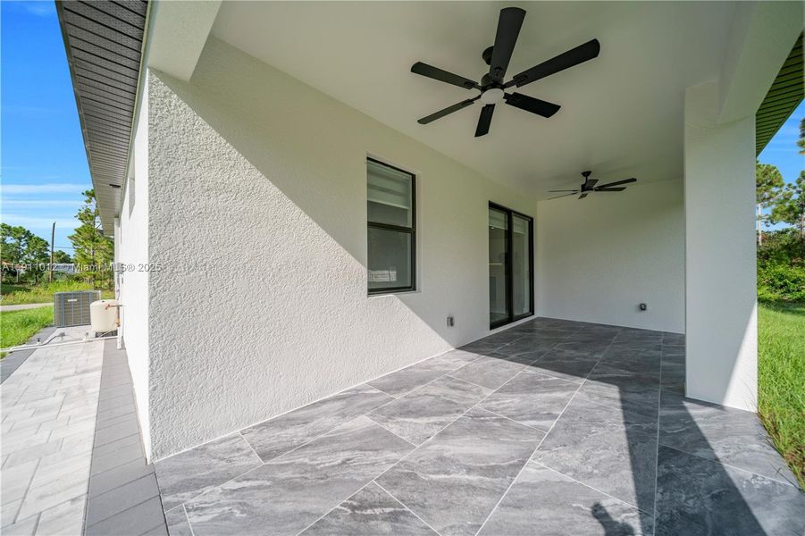 Exterior details and patio area of a home in , Lehigh Acres (Image 4). Exterior details and patio area of a home in , Lehigh Acres (Image 4).